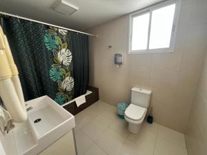 Koupelna v ubytování Hotel Dila