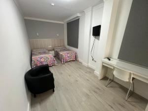 TV a/nebo společenská místnost v ubytování Hotel Dila