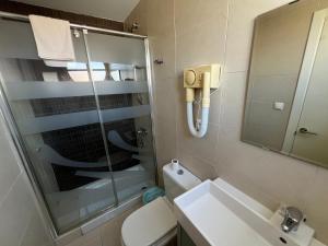 Koupelna v ubytování Hotel Dila