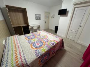 TV a/nebo společenská místnost v ubytování Hotel Dila