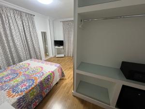 TV a/nebo společenská místnost v ubytování Hotel Dila