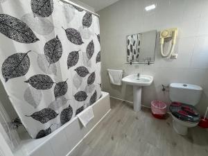 Koupelna v ubytování Hotel Dila