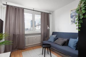 Posedenie v ubytovaní Wola Lavish Apartment