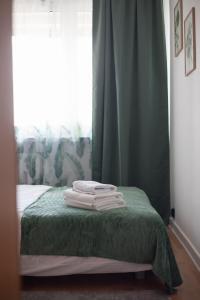 Posteľ alebo postele v izbe v ubytovaní Wola Lavish Apartment