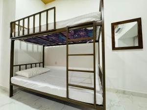 Uma cama ou camas num quarto em Havelock City Hostel, Colombo