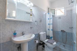 Kúpeľňa v ubytovaní Agnadi Blue Apartments