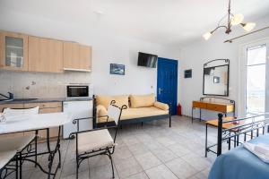 Kuchyňa alebo kuchynka v ubytovaní Agnadi Blue Apartments