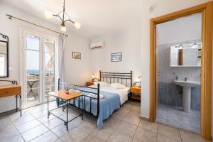 Posteľ alebo postele v izbe v ubytovaní Agnadi Blue Apartments