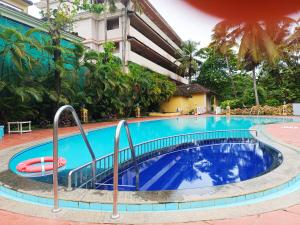 Bazén v ubytování Carina Beach Resort nebo v jeho okolí
