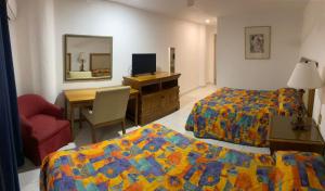 Postel nebo postele na pokoji v ubytování Hotel Paquime + 21 fotografií