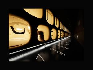 a woman is looking out the windows of an airplane at 9h nine hours Sendai in Sendai