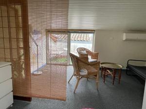 Posezení v ubytování Logement familial Etage entier