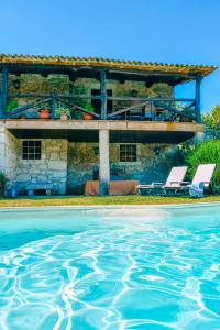 Swimmingpoolen hos eller tæt på Just Like Home - Casa do Cadinho