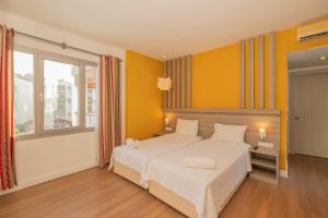 Postel nebo postele na pokoji v ubytování Ladonia Hotels Mio Bianco