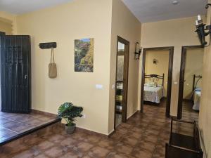 Posteľ alebo postele v izbe v ubytovaní Alojamiento Rural Casitas Cueva del Gato