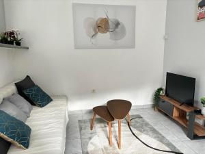 Et opholdsområde på Joli T2 avec jardin - calme & chaleureux