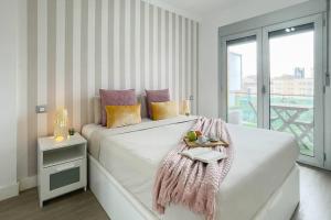 Una cama o camas en una habitación de Ramblas Dreams 32 fotos más