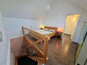 Ένα ή περισσότερα κρεβάτια σε δωμάτιο στο Ferienhaus ImObstgarten Diez