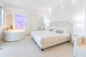 Postel nebo postele na pokoji v ubytování Hotel Al Cavallino Bianco