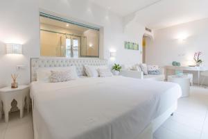 Postel nebo postele na pokoji v ubytování Hotel Al Cavallino Bianco