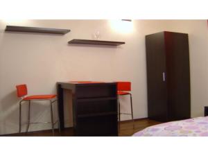 Postel nebo postele na pokoji v ubytování Studio Victoriei