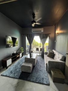 Posezení v ubytování Bayu Beach Resort Port Dickson Santai PD Homestay 2 Bedroom Apartment