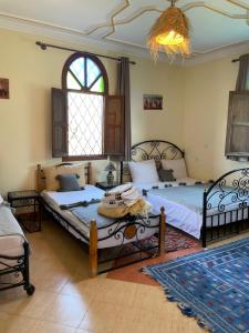 Auberge Les Sapins客房内的一张或多张床位