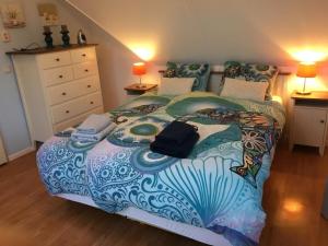 เตียงในห้องที่ Beachvilla Grachtenblik
