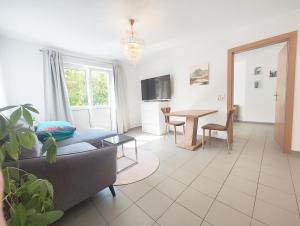 TV a/nebo společenská místnost v ubytování Wohnung in traumhafter Lage!