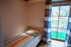 Postel nebo postele na pokoji v ubytování Mulino Glurns