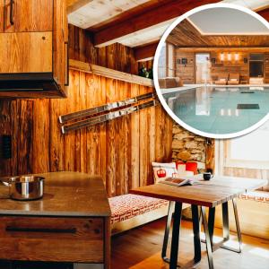 cocina con mesa y piscina en Chalet des Amis by Lodji, en Saint-Marcel