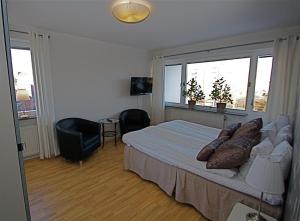 Postel nebo postele na pokoji v ubytování Riverside stay at Hotel - Ängelholm