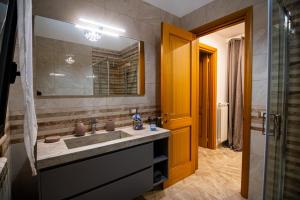 Koupelna v ubytování Casa D'Amico + 10 fotografií