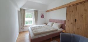 Ένα ή περισσότερα κρεβάτια σε δωμάτιο στο Haus Hinz 3-Zi Fe-Wo an der Ostsee