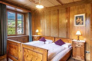 Una cama o camas en una habitación de Zum Hirschen Al Cervo