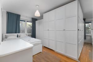 Posteľ alebo postele v izbe v ubytovaní Aleja Jana Pawła II 65 by Homeprime
