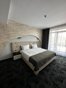 Postel nebo postele na pokoji v ubytování Black Tulip Hotel
