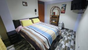 Postel nebo postele na pokoji v ubytování TRANSFER VIP HOSTEL
