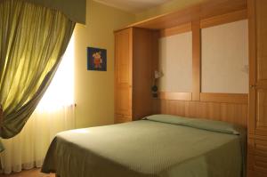 Postel nebo postele na pokoji v ubytování BiancaNeve B&B