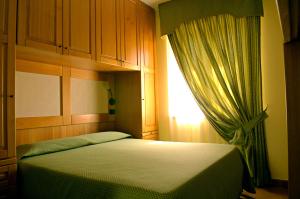 Postel nebo postele na pokoji v ubytování BiancaNeve B&B