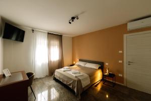 Postel nebo postele na pokoji v ubytování Martina’s Rooms + 6 fotografií