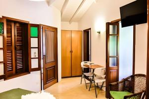 Et tv og/eller underholdning på Pousada Forte Rocha