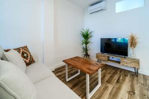 Μια τηλεόραση ή/και κέντρο ψυχαγωγίας στο Esencia del Arenal Javea Apartment by Rock Rentals