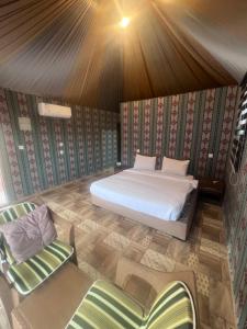 Postel nebo postele na pokoji v ubytování Lulua luxury camp