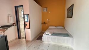 Cama ou camas em um quarto em Pousada Canto do Mar Ilha Grande