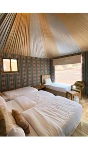 Postel nebo postele na pokoji v ubytování Lulua luxury camp