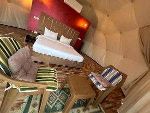Postel nebo postele na pokoji v ubytování Lulua luxury camp