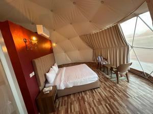 Postel nebo postele na pokoji v ubytování Lulua luxury camp