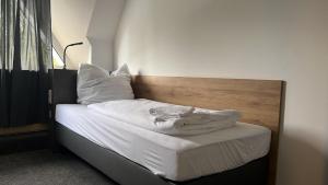 Postel nebo postele na pokoji v ubytování Hotel Belvedere