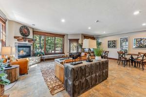 a living room filled with furniture and a fireplace at Breckenridge Condo: Large Patio & Shared Amenities in Breckenridge